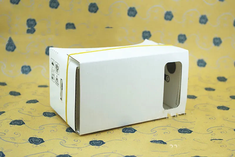 Pink and white cardboard VR glasses for smartphones with adjustable rubber band head strap