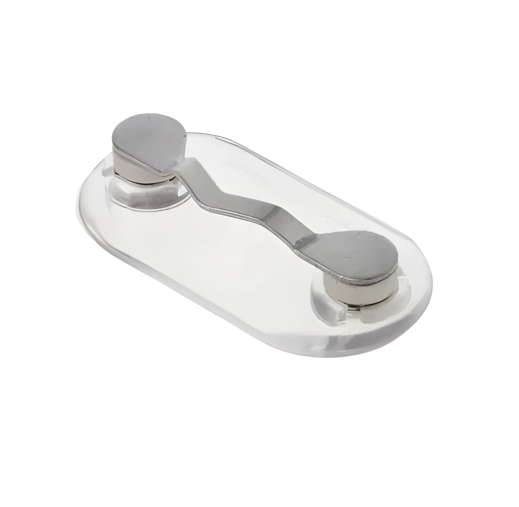 Black magnetic glasses holder attached to car dashboard with spectacles stored on bracket