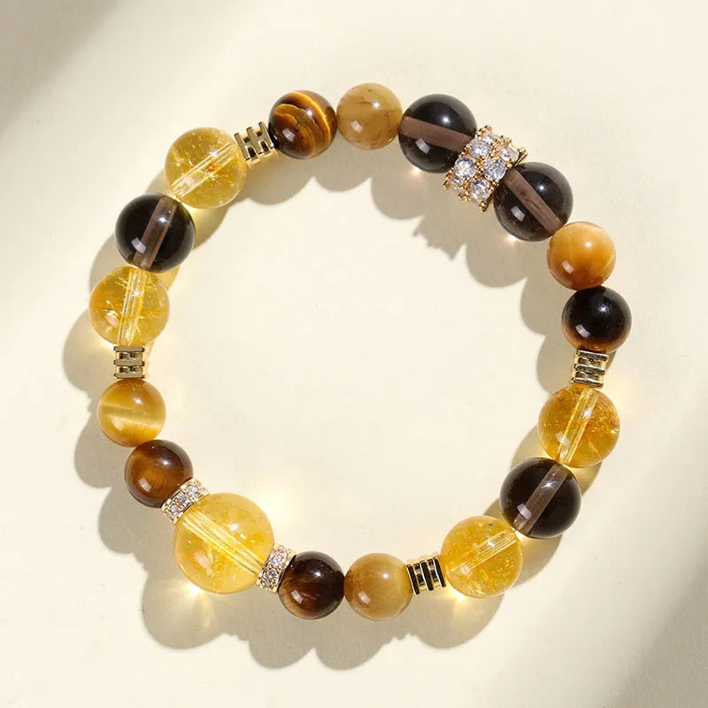 Natural yellow tower crystal string beads bracelet with 10mm Jinba beads on wrist