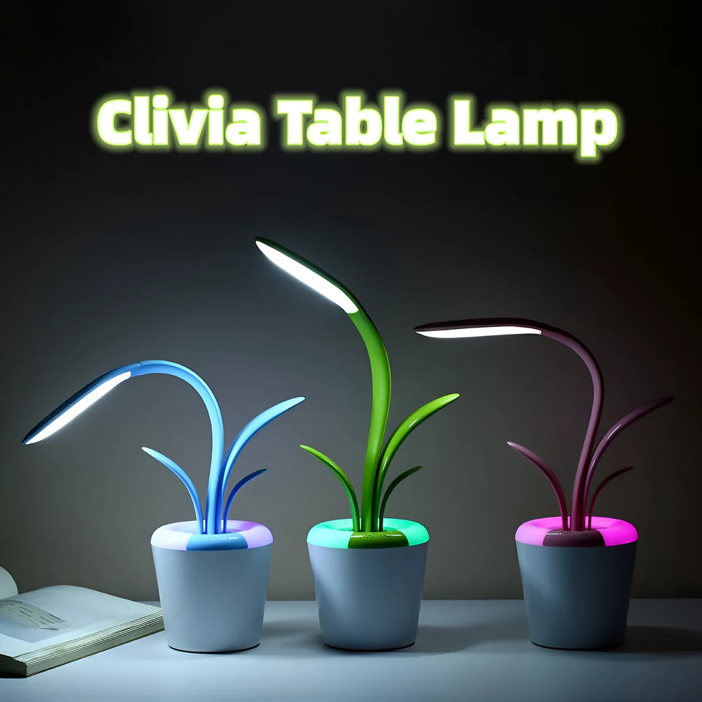 Modern rechargeable LED table lamp in blue with stylised plant shape on end table