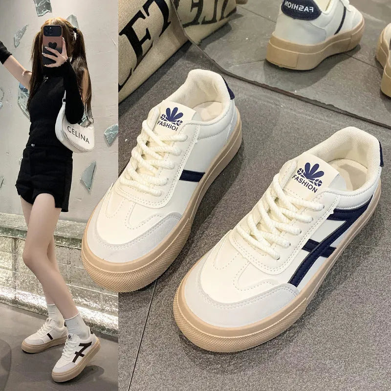 Brown and blue low-top women's casual lace-up shoes with round toe and patent leather finish.