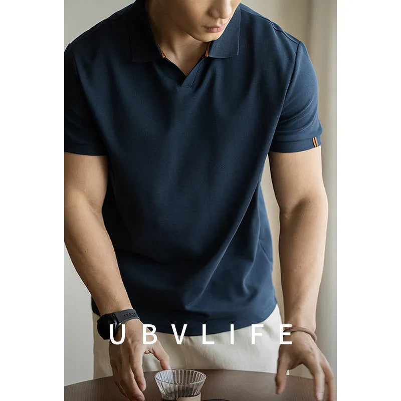 Blue cotton polyester polo shirt with short sleeves and regular fit for summer casual wear
