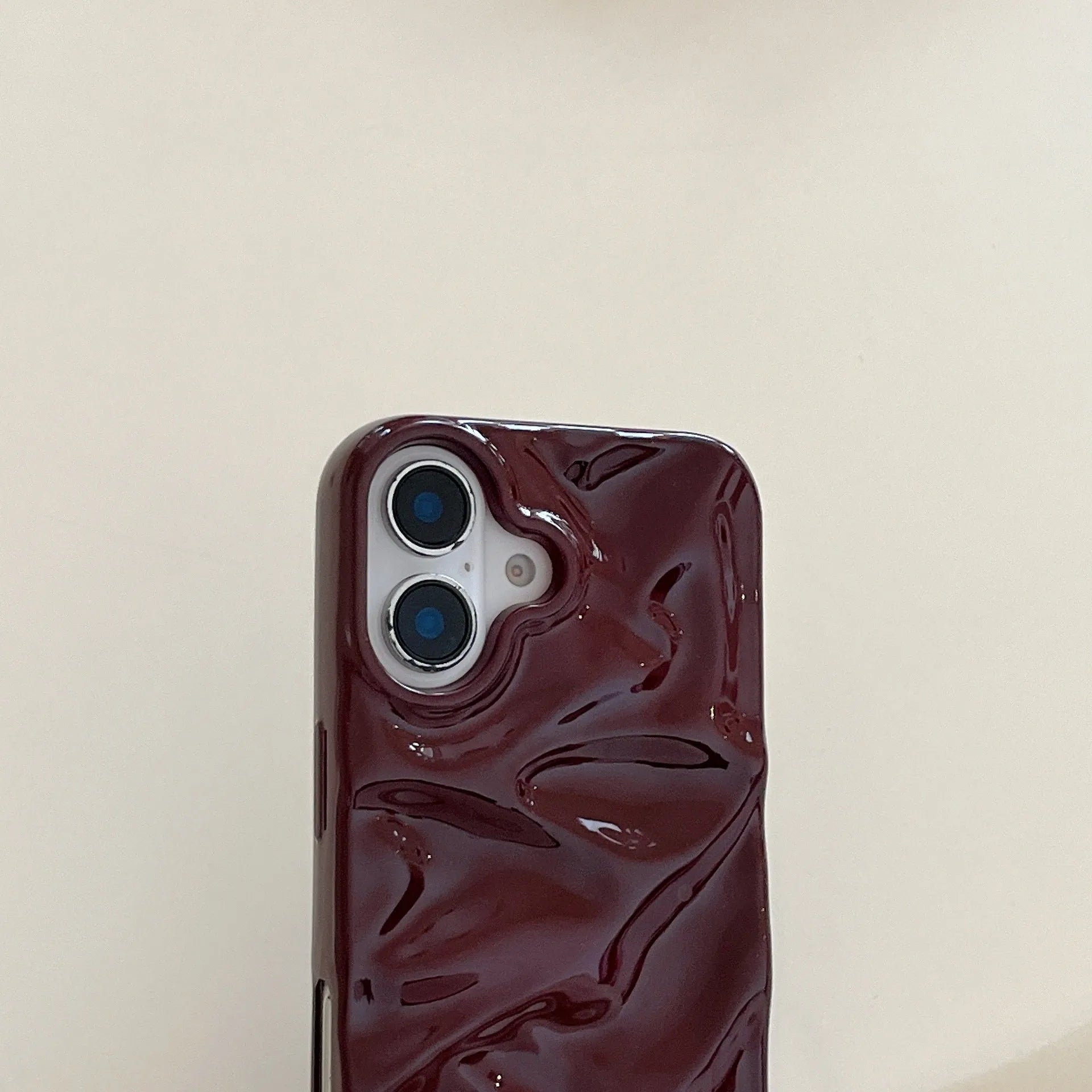 Niche irregular pleated three-dimensional TPU phone case in wine red for iPhone
