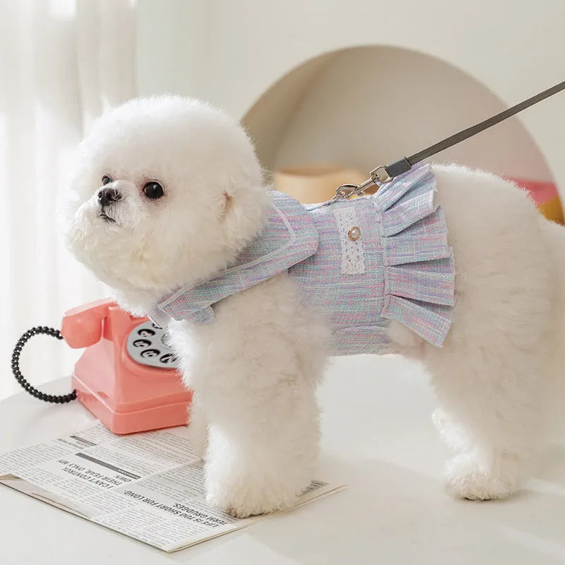 Purple and pink polyester pet clothing for cats or small dogs in sizes S, M, L, and XL.