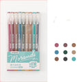 Set of nine retro Japanese colour gel pens with 0.5mm needle tips on white background
