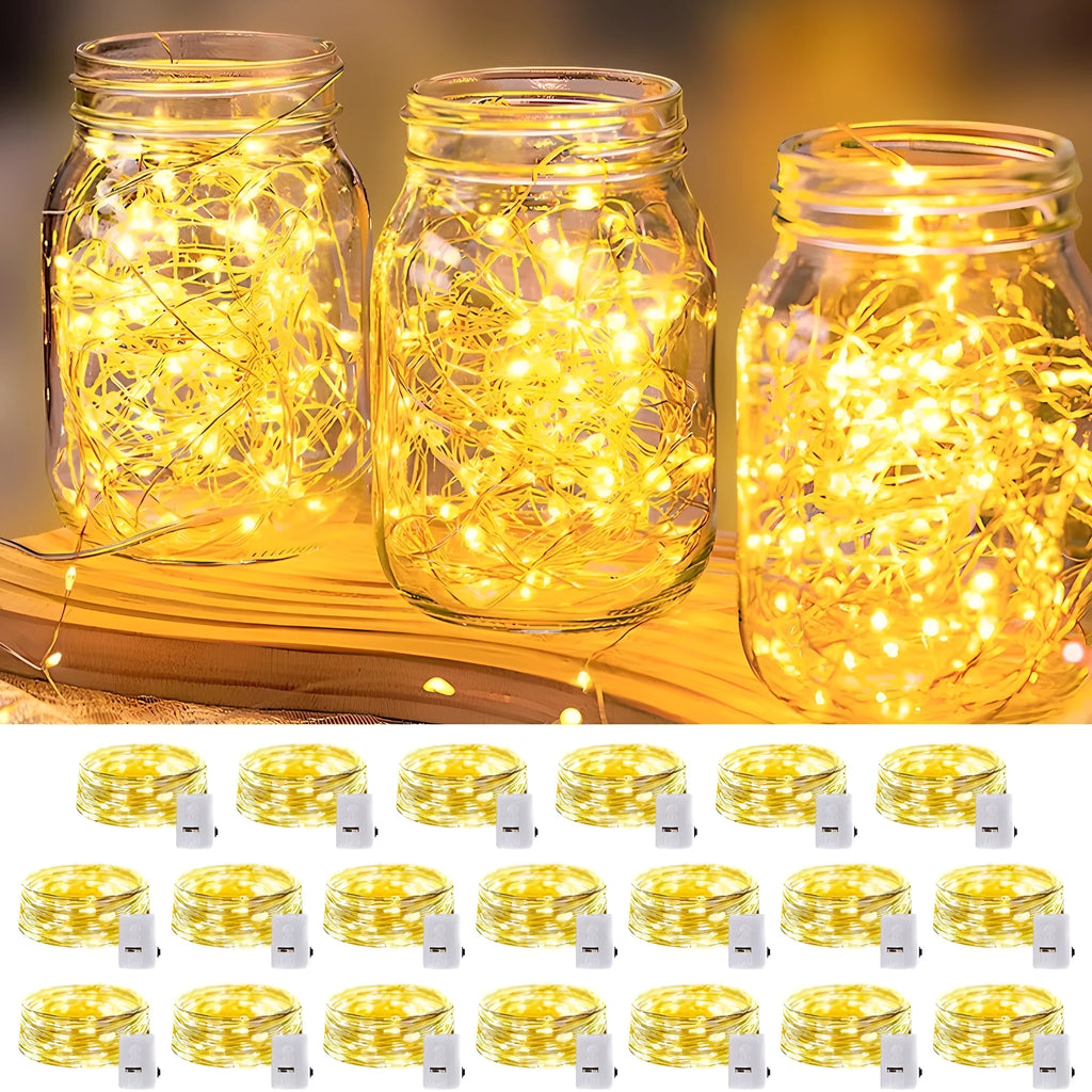LED waterproof firefly string lights with warm white bulbs in 1m length on a dark background