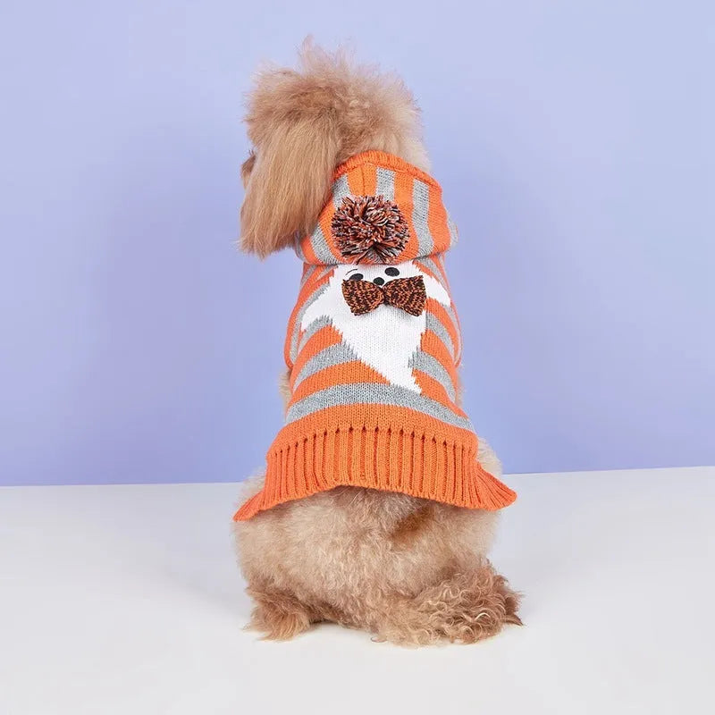 Orange Halloween pet sweater with striped pattern, fur ball decorations, and a hood for dogs or cats.