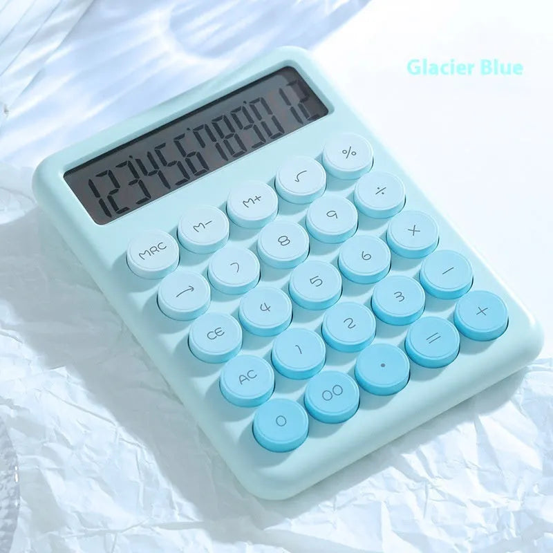 Dopamine gradient colour desktop calculator in violet, pink, blue, or green on a desk.