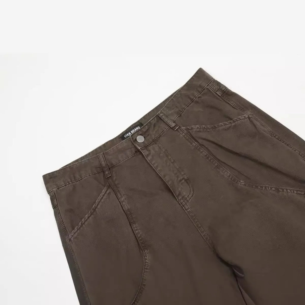 Men's brown straight-leg cotton trousers with high waist and zipper fly closure