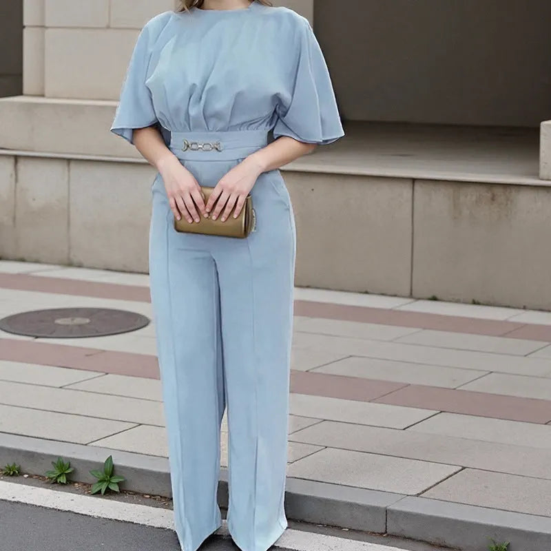 Blue men's two-piece polyester suit with jacket and trousers on a hanger