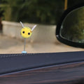 Cartoon-style little bee car decoration made from a soft fur ball, shown next to a ruler showing its 3cm size.