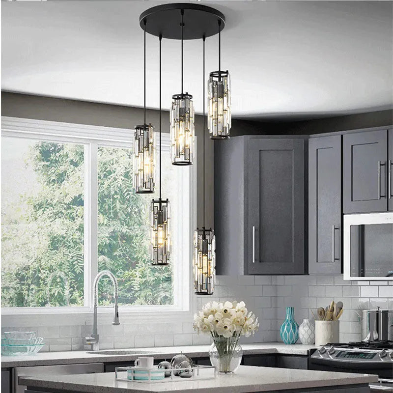 Industrial style crystal LED single head droplight pendant light in black, chrome, or gold finish.