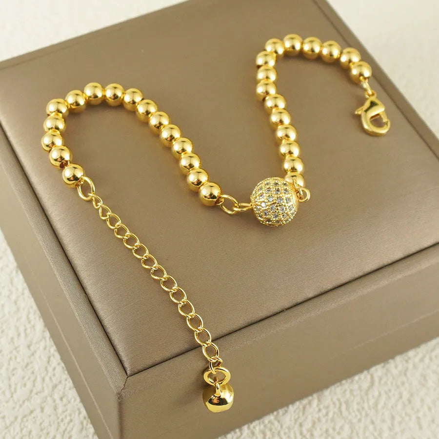 Women's heart-shaped copper bracelet with zircon stones in an Arabic style design.