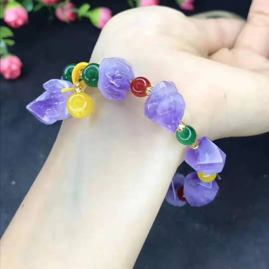 Natural shaped amethyst bead bracelet with fu character element on wrist