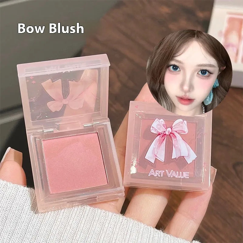 Butterfly Box Suite makeup set with pink lip muds, blush, and necklace