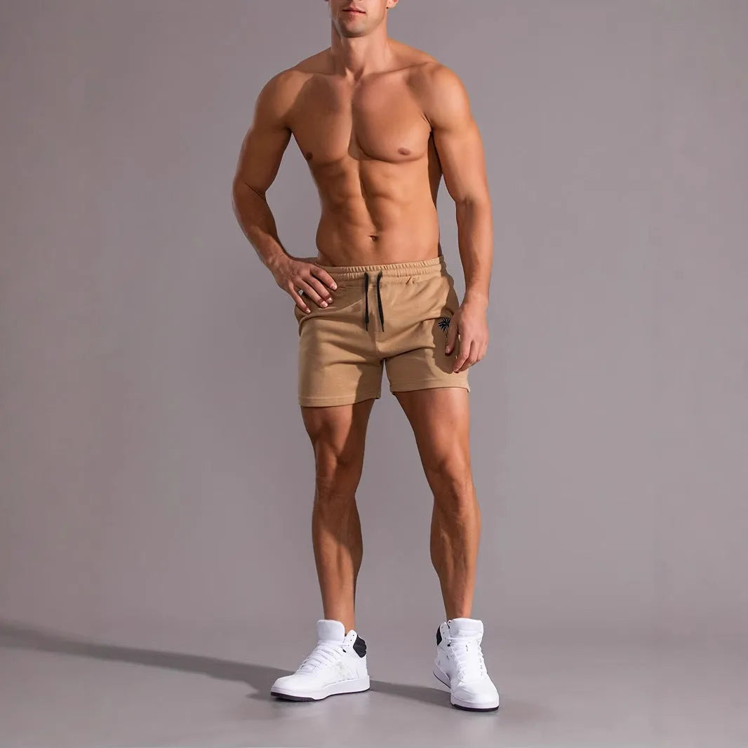 Men's khaki coconut print polyester sports shorts with straight cut design