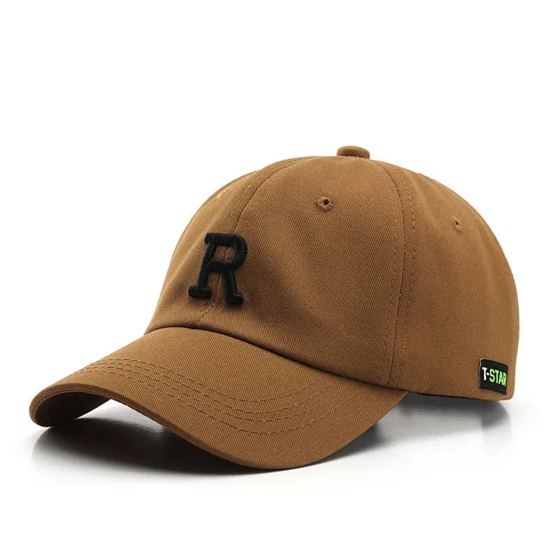 Adjustable unisex baseball cap with embroidered letter R in black cotton satin weave with brim