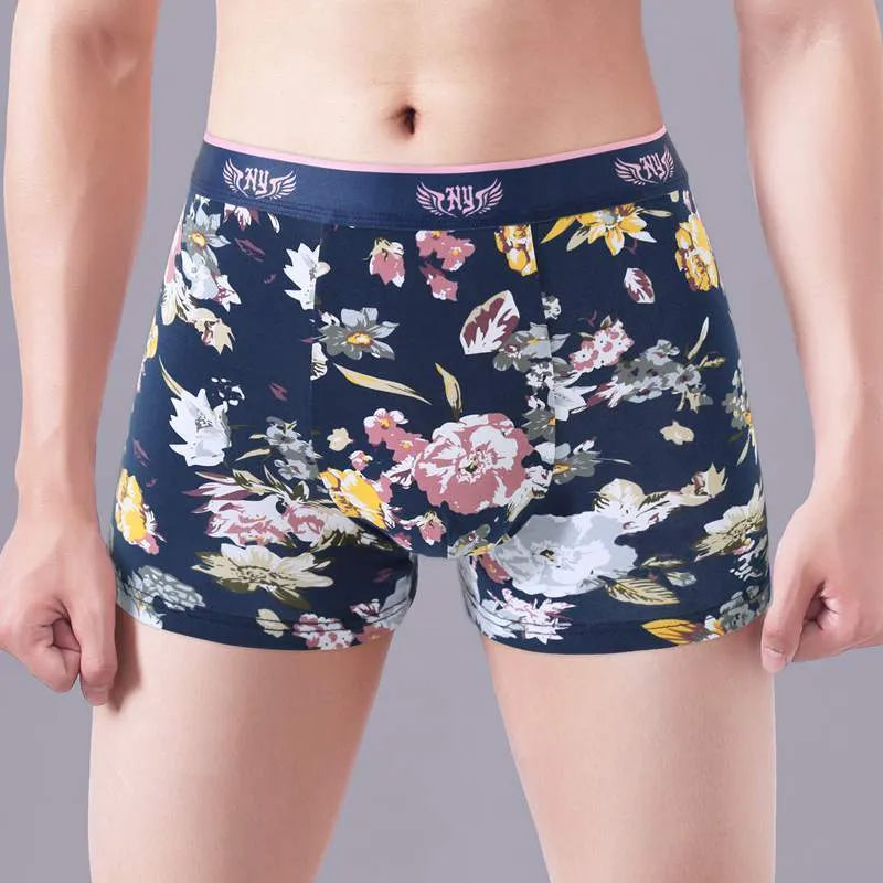 Men's purified cotton boxer shorts in a floral pattern, showing mid-waist fit and U-shaped pouch design.