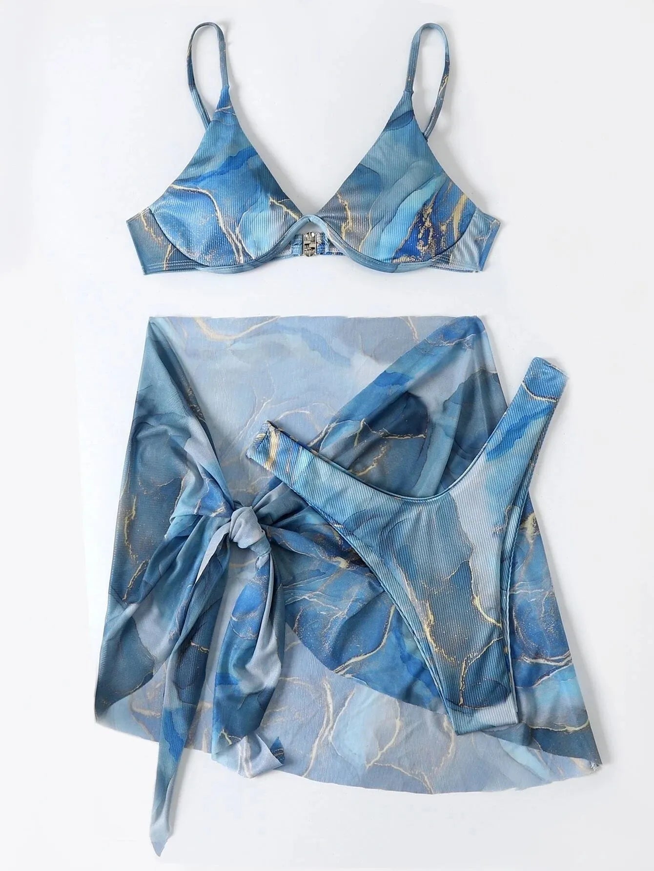 Marble print three-piece bikini swimwear set with skirt on a mannequin.