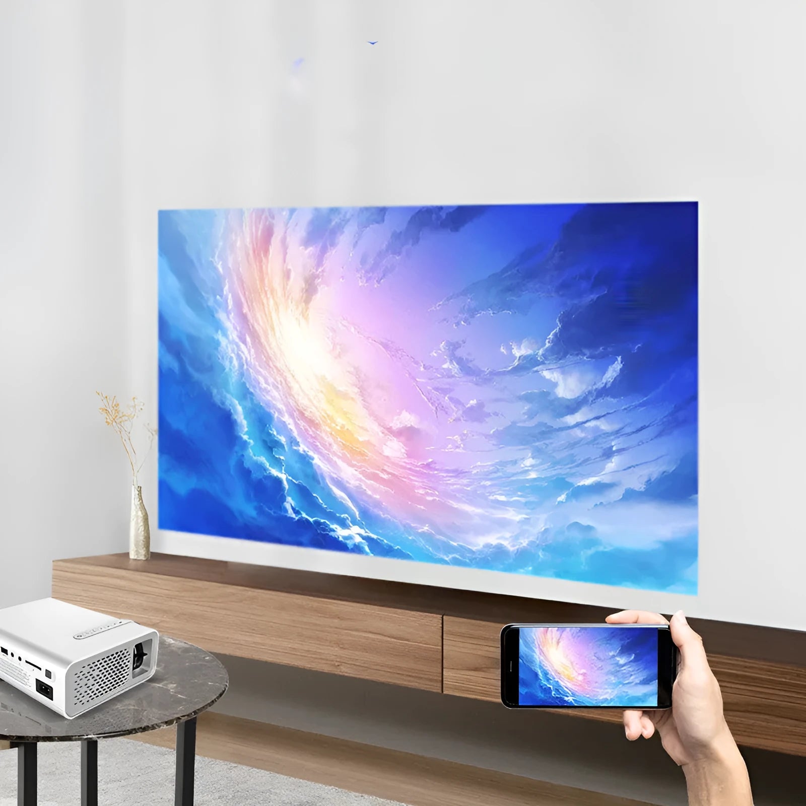 YG530 mini mobile phone projector in black or white with LED lens and wireless connectivity