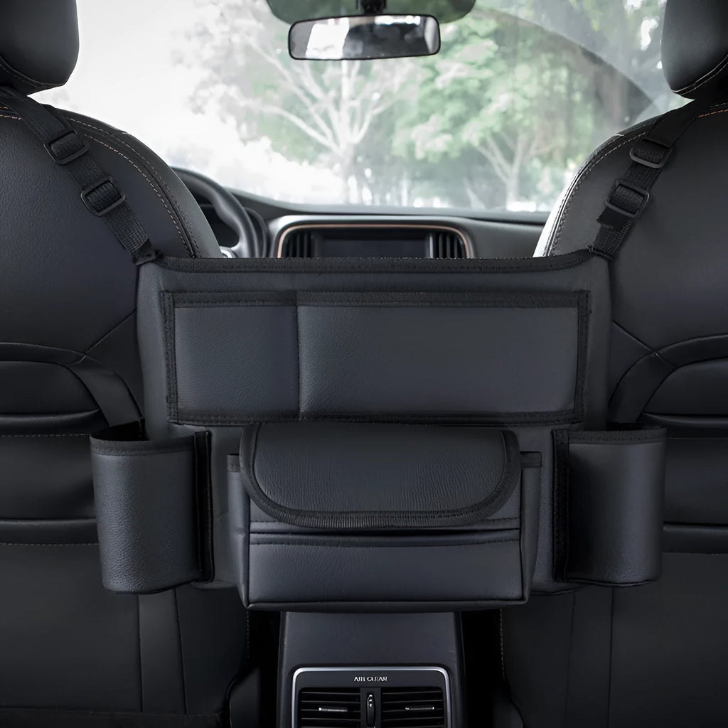 Black leather car seat organiser tissue box holder hanging between front seats