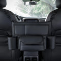 Black leather car seat organiser tissue box holder hanging between front seats
