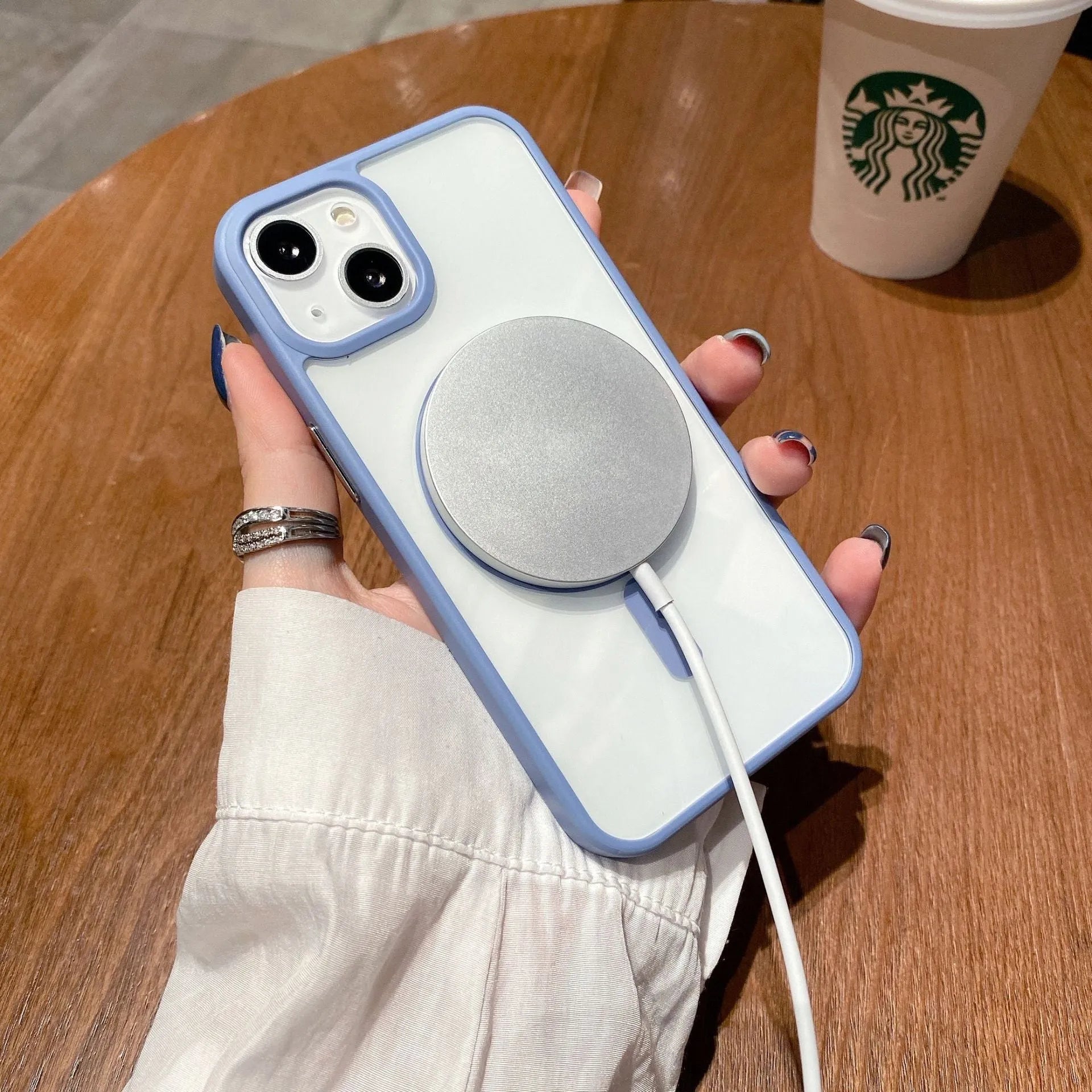 Transparent acrylic Magsafe phone case for iPhone with magnetic ring, shown in multiple colour options