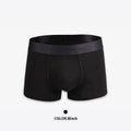 Men's solid colour cotton boxer underwear shown in available colours with elastic waistband