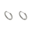 A pair of geometric round eyelet ear clips for women in gold or silver plating.