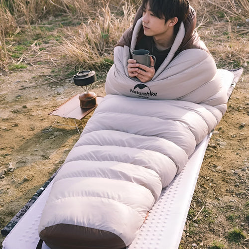 Goose down mummy sleeping bag for adults with storage bag