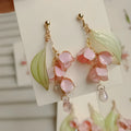 Copper wire resin flower earrings with heavy industry retro Linglan eardrops design on white background
