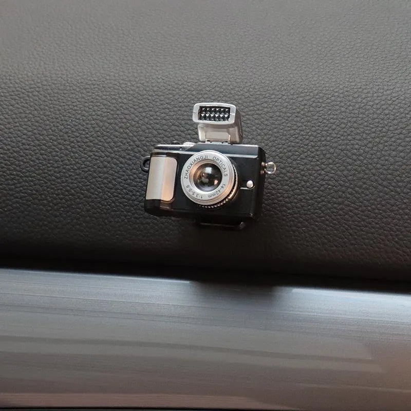 Set of four retro camera dot design plastic adhesive hooks for car interior, each measuring 4.2cm by 2.5cm.