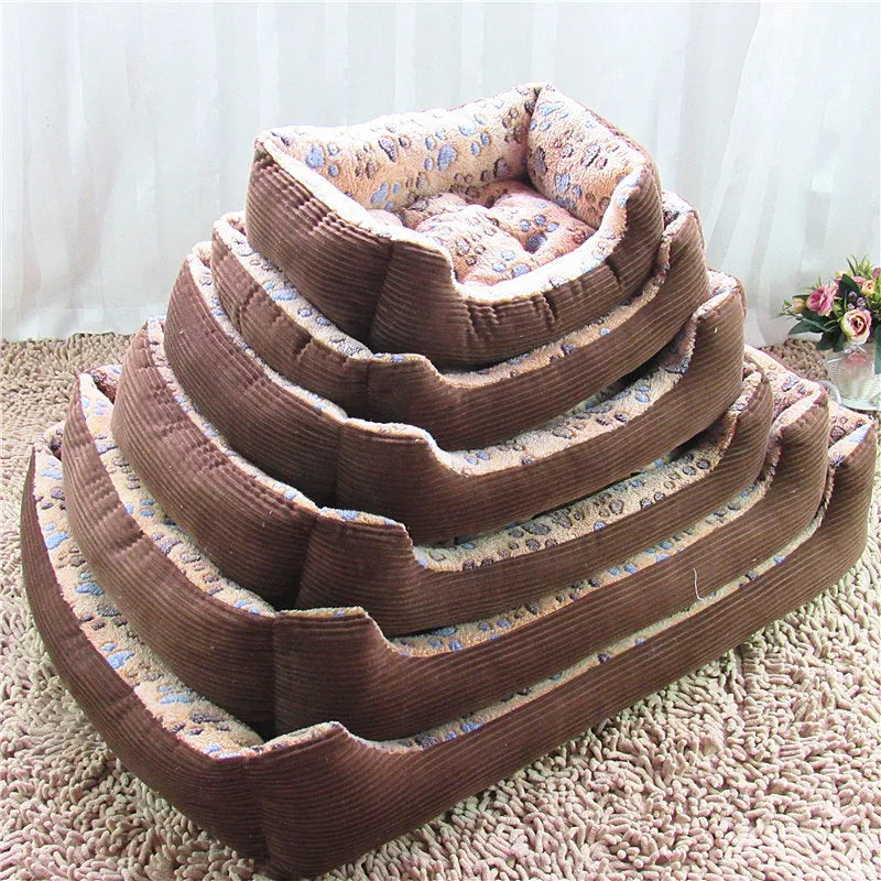 Beige sofa kennel-style dog bed with soft plush fabric and raised foam sides for a small pet.