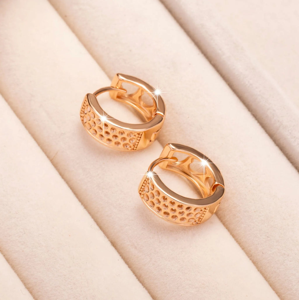 Rose gold hollowed-out heart-shaped earrings with three-layer openwork design