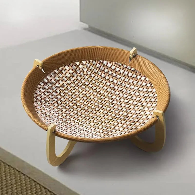 Brown woven rattan pet hammock bed for cats and small dogs on elevated stand