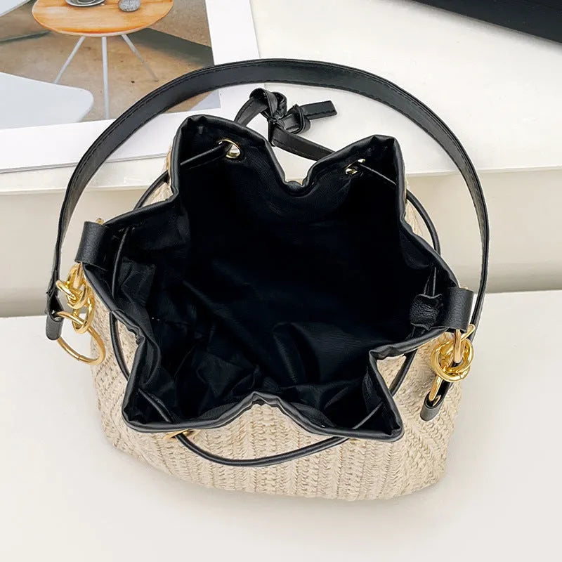 Straw woven women's crossbody shoulder bag with contrast colour trim and phone pocket