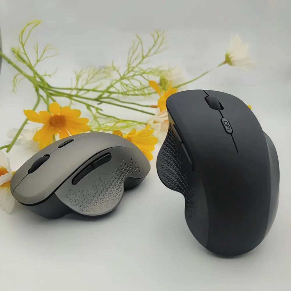 Grey and black wireless self-charging mouse for laptops with USB cable