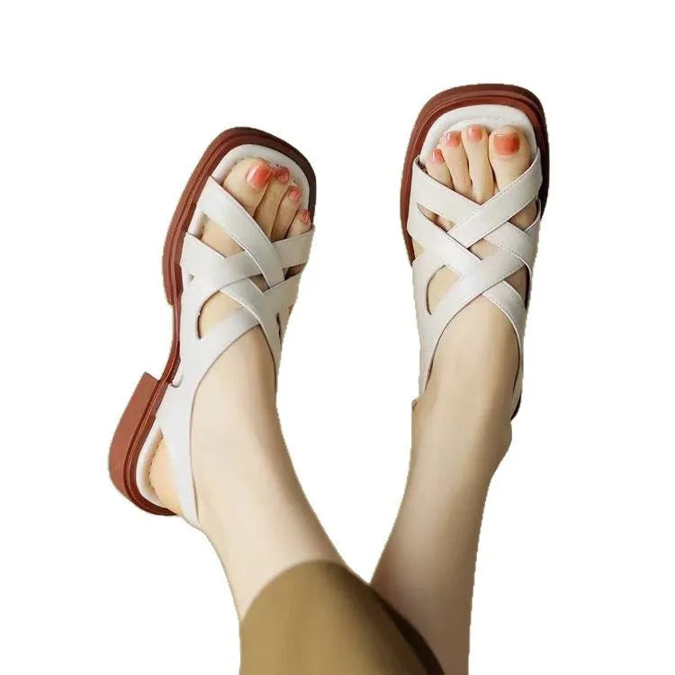 Women's patent leather square toe beach sandals with cross straps in black, brown, and off-white colours.