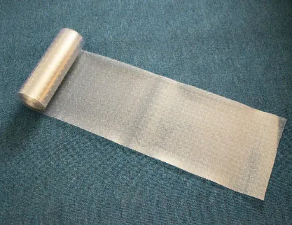 Transparent PVC cat scratch protective pad on a carpet at a door threshold, featuring anti-scratch wear-resistant surface