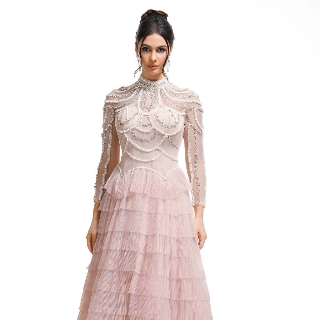 Women's long sleeve beaded evening dress in black or pink with three-dimensional decoration