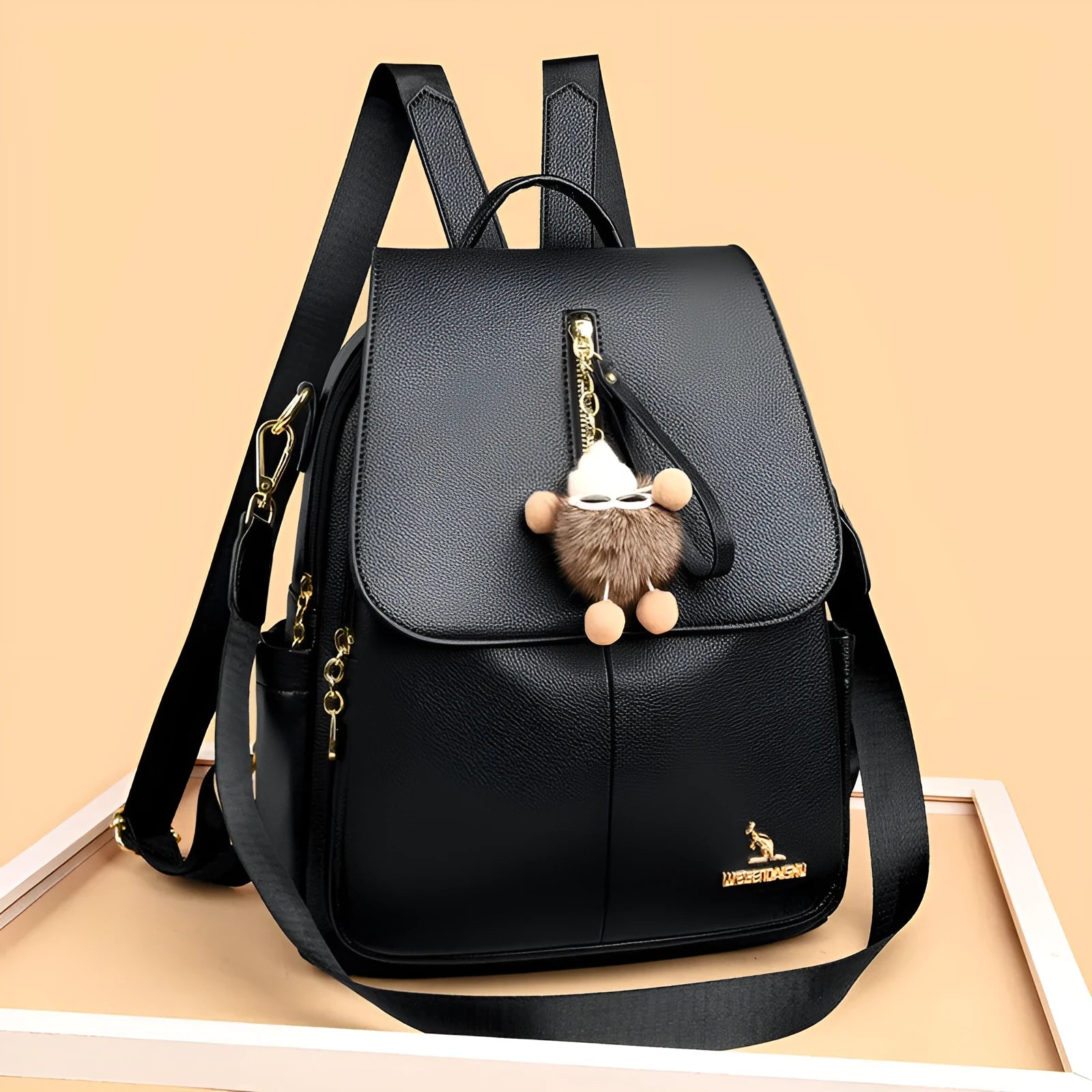 Genuine leather women's student travel backpack with pendant in beige colour, featuring covered outer pocket and belt decoration