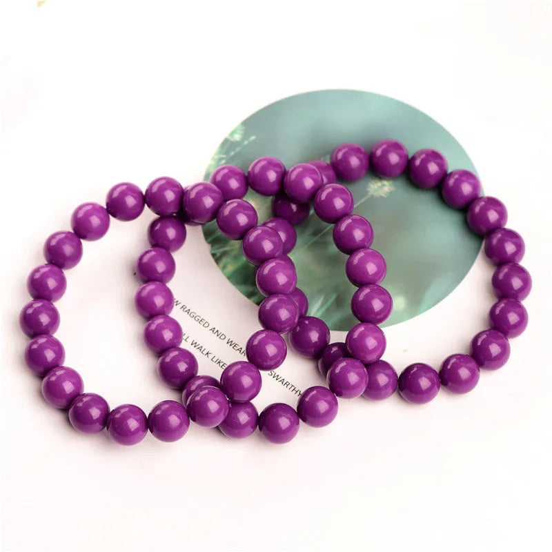 Jiuya purple mica crystal bracelet showing polished stones in 5A colour grade
