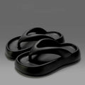 Solid colour thick-soled EVA flip-flops with a bow detail, shown in multiple colours.