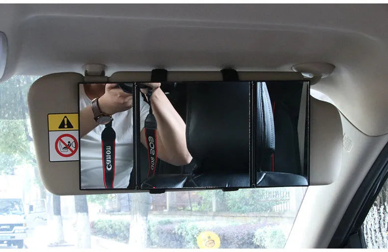 Silver folding car visor makeup mirror shown open and closed on a car sun visor