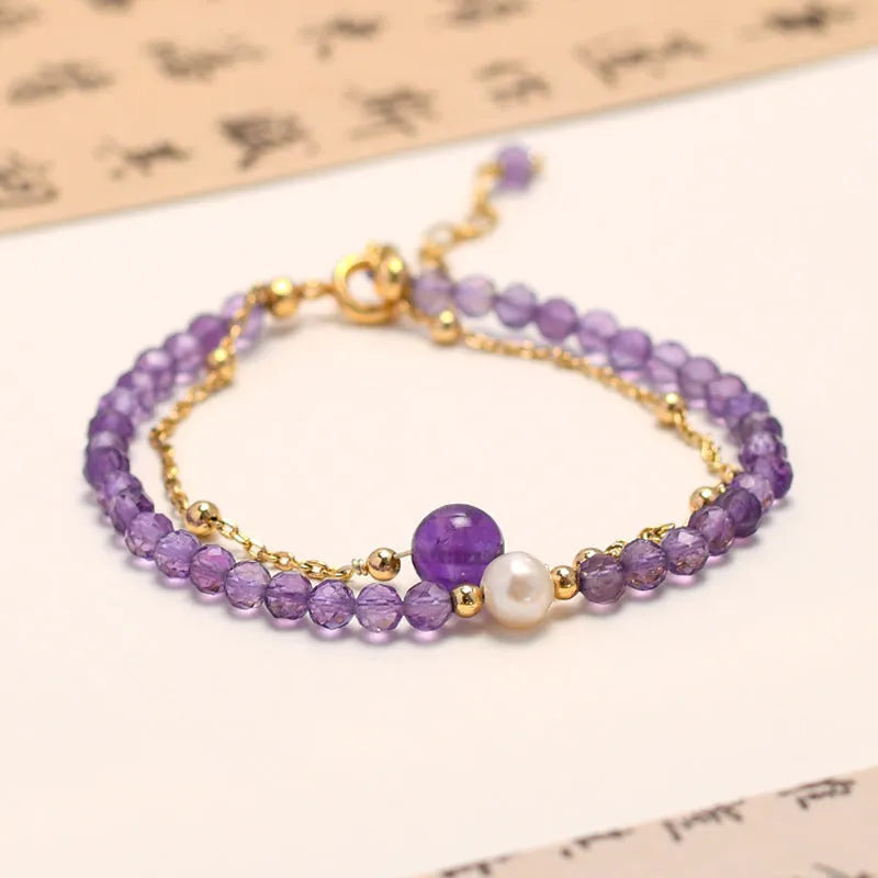 Women's amethyst bracelet with electroplated crystal stones in a diamond Chinese pattern.