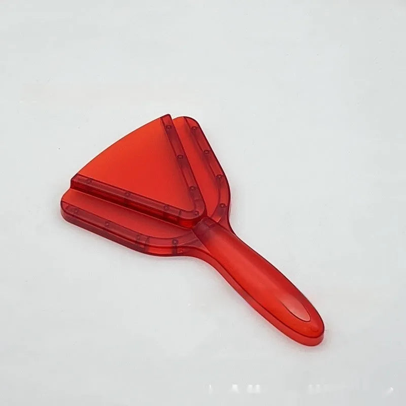 Red telescopic bottle opener with non-slip jaws, shown extended on a kitchen counter.