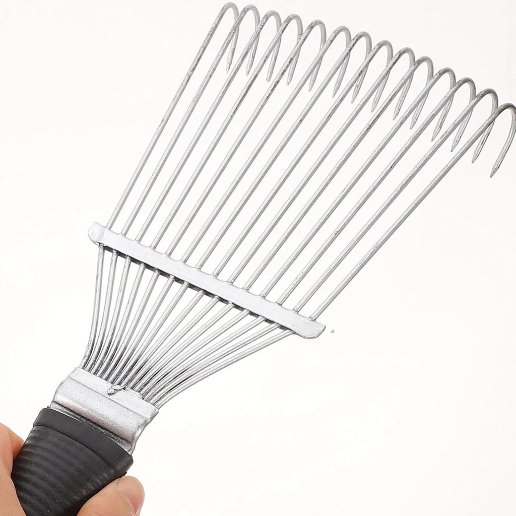 Stainless steel dematting brush rake comb for grooming horses and dogs on a wooden surface