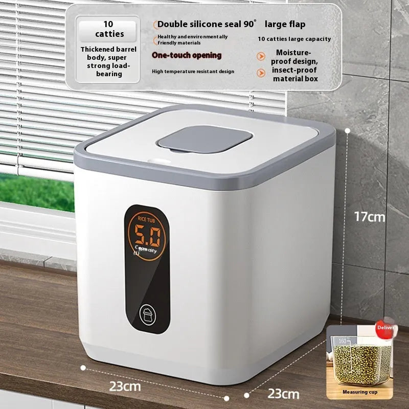 Grey plastic rice storage jar with lid and a measuring cup, for 10kg 20kg or 30kg capacity.