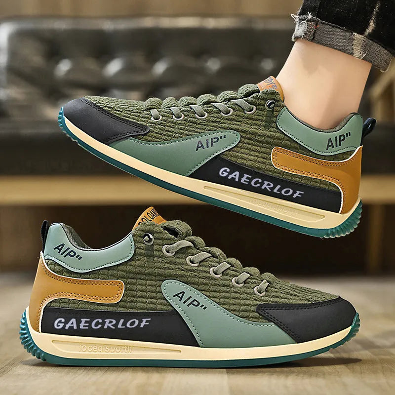 Men's grey and green mesh running shoes with lace-up closure and round toe