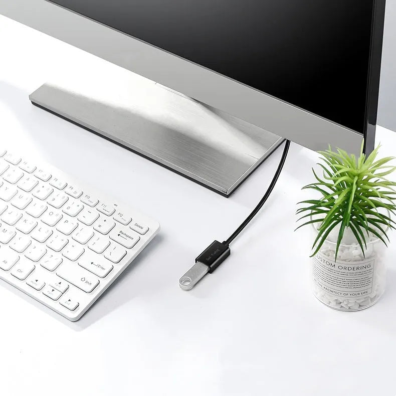 Black USB 3.0 and 2.0 male to female extension cable with double-layer shielding.